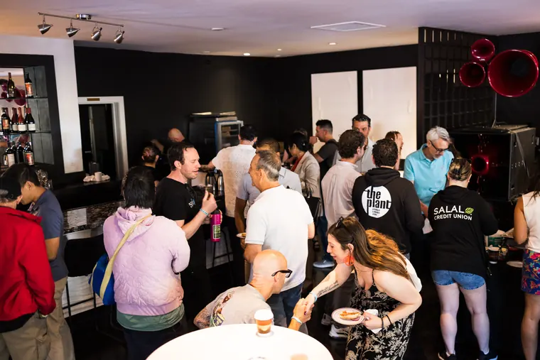 Packed clubhouse room during the Bash